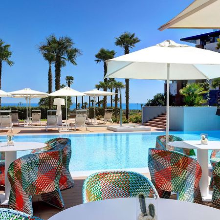 Almar Jesolo Resort & Spa Esterno foto The pool at the hotel