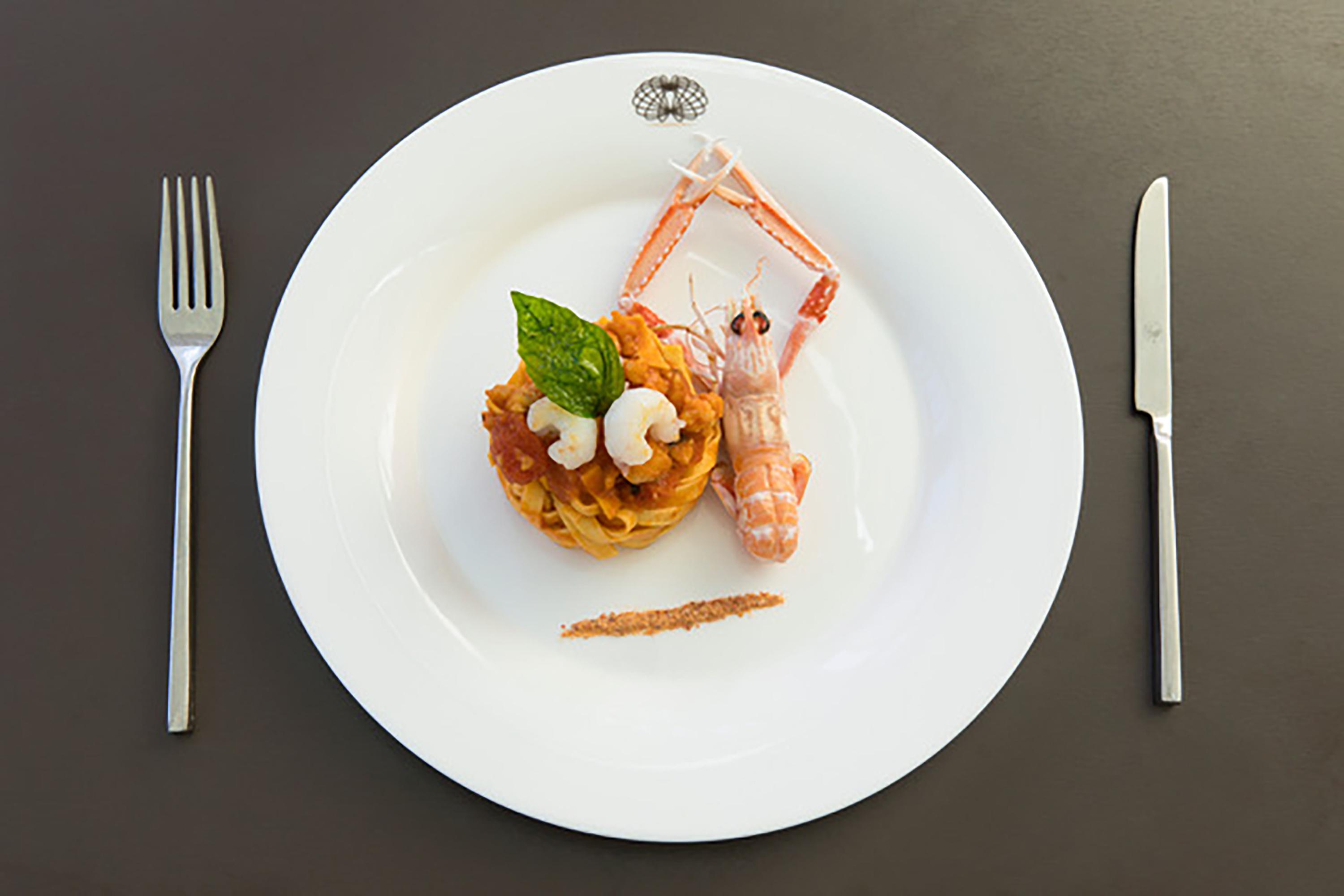 Almar Jesolo Resort & Spa Esterno foto A plate of food