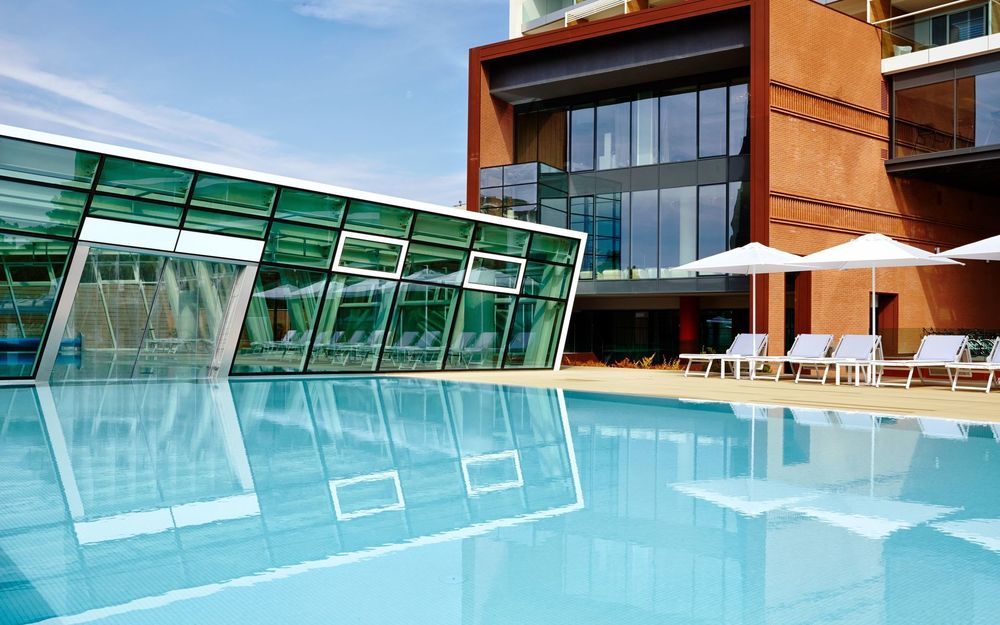 Almar Jesolo Resort & Spa Esterno foto The swimming pool at the hotel